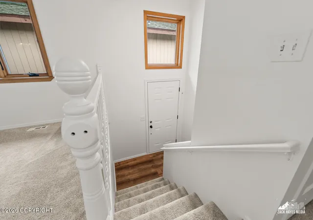 Photo 3 of Single family home for sale at 7701 Delridge Cir, Anchorage, AK 99507 | MLS# 26-10429 | Listing updated on 2026-10-05