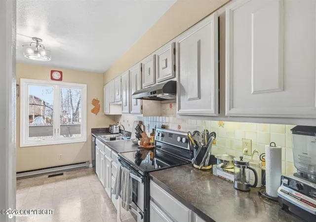 Photo 3 of Sale Pending at 3136 W 34th Avenue #6A1C, Anchorage, AK 99517 | MLS# 26-5333 | Listing updated on 2026-08-21