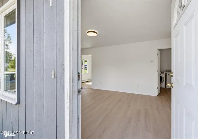 Photo 3 of Multi family home for sale at 6730 Zurich St, Anchorage, AK 99507 | MLS# 26-7140 | Listing updated on 2026-10-09