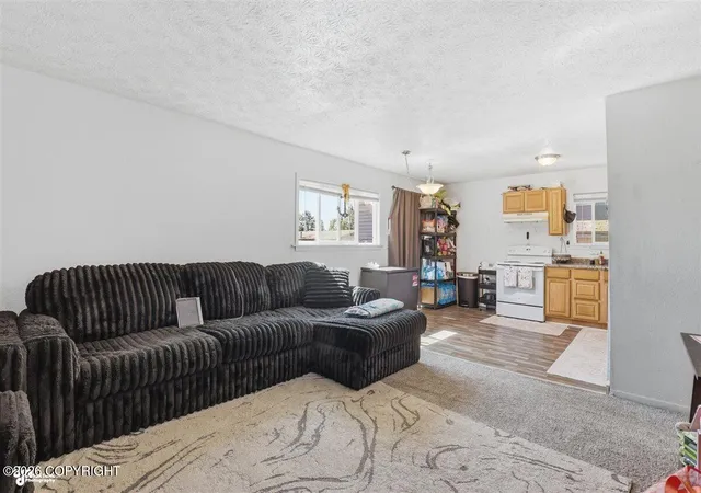 Photo 2 of Multi family home for sale at 4027 E 8th Avenue, Anchorage, AK 99508 | MLS# 26-6491 | Listing updated on 2026-07-09
