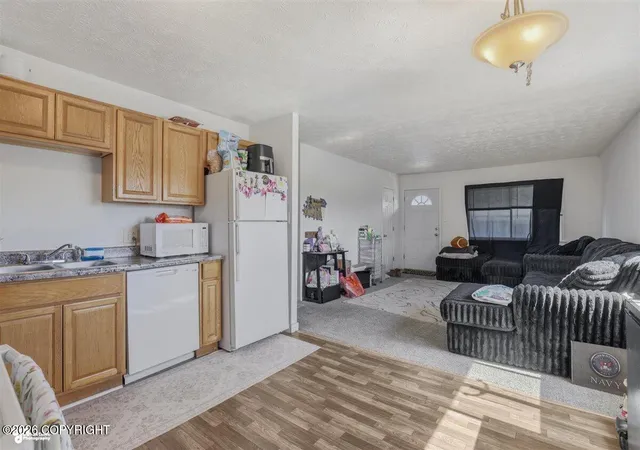 Photo 4 of Multi family home for sale at 4027 E 8th Avenue, Anchorage, AK 99508 | MLS# 26-6491 | Listing updated on 2026-07-09