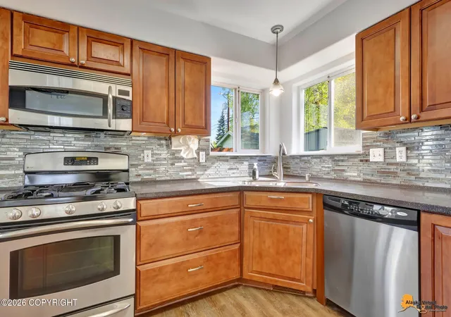 Photo 1 of Sale Pending at 7731 Big Spruce Cir, Anchorage, AK 99502 | MLS# 26-6672 | Listing updated on 2026-08-31
