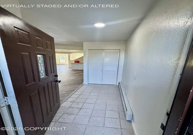 2nd image of 1430 Bridgeway St #9, Anchorage, AK 99501 | MLS# 26-7392