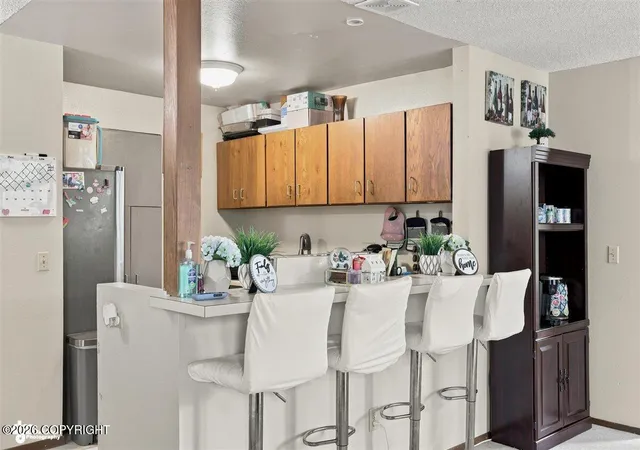 Photo 5 of Sale Pending at 1003 Wildrose Ct, Anchorage, AK 99518 | MLS# 26-7812 | Listing updated on 2026-09-06
