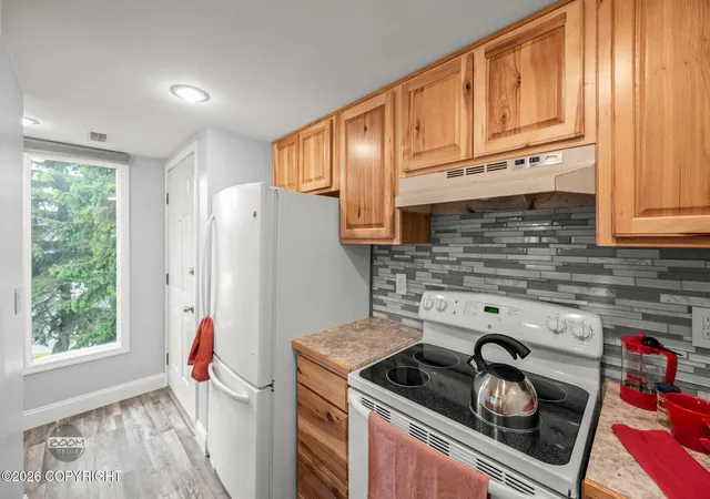 3rd image of 2310 Sentry Dr #F705, Anchorage, AK 99507 | MLS# 26-7865