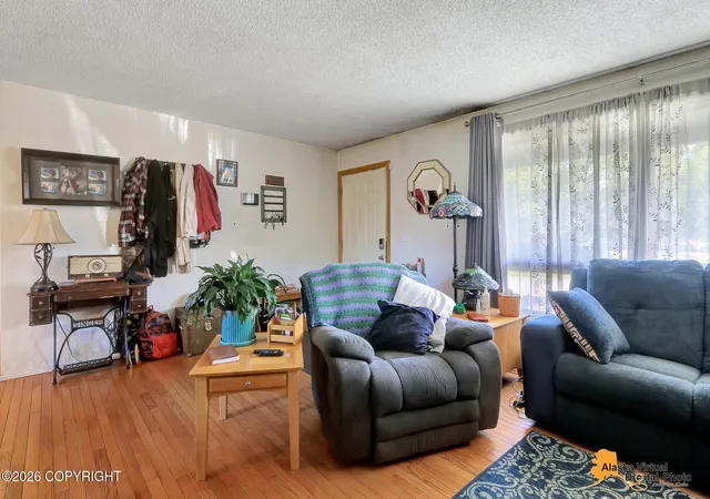 Photo 4 of Single family home for sale at 8410 Dagan St, Anchorage, AK 99502 | MLS# 26-8185 | Listing updated on 2026-10-08