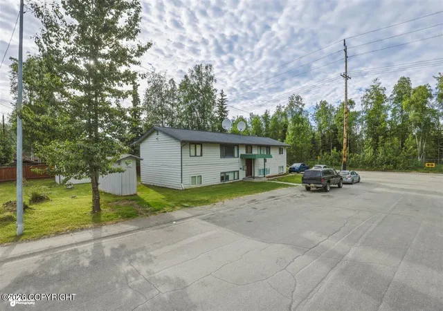 Photo 2 of Multi family home for sale at 430 Schodde St, Anchorage, AK 99508 | MLS# 26-7991 | Listing updated on 2026-08-23