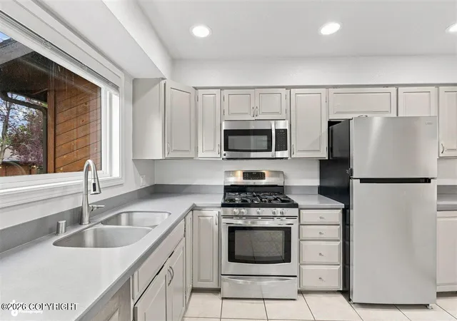 Photo 3 of Condo for sale at 12301 Johns Rd #27, Anchorage, AK 99515 | MLS# 26-10731 | Listing updated on 2026-10-09