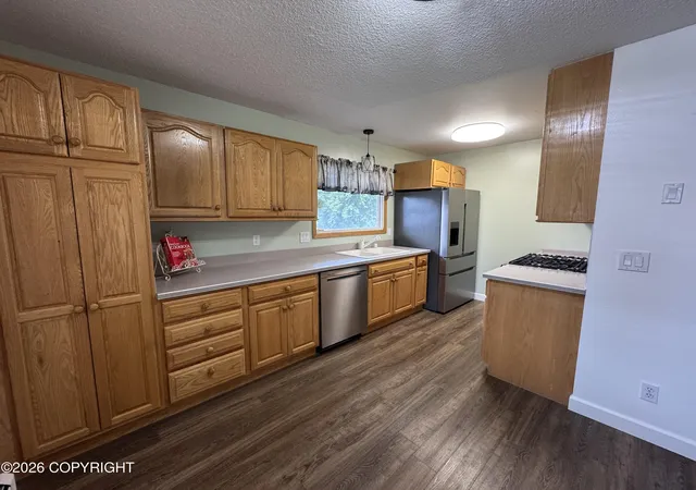 Photo 3 of Single family home for sale at 4711 Shelikof St, Anchorage, AK 99507 | MLS# 26-8270 | Listing updated on 2026-09-09