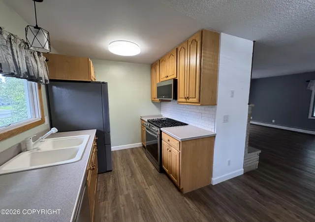 Photo 4 of Single family home for sale at 4711 Shelikof St, Anchorage, AK 99507 | MLS# 26-8270 | Listing updated on 2026-09-09