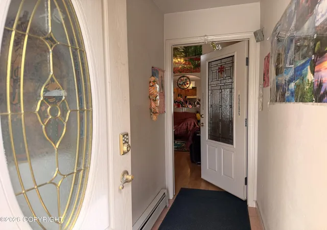 Photo 3 of Single family home for sale at 285 Flower St, Anchorage, AK 99508 | MLS# 26-8467 | Listing updated on 2026-09-01