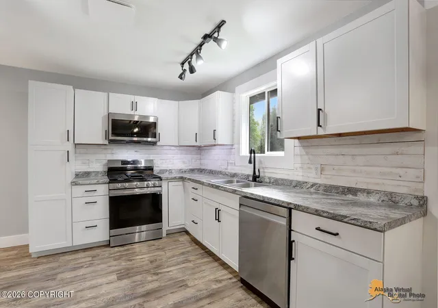 Photo 3 of Single family home for sale at 1100 N Retreat Ave, Palmer, AK 99645 | MLS# 26-9285 | Listing updated on 2026-10-01