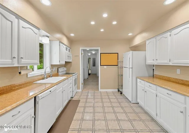 Photo 3 of Single family home for sale at 51850 Rediske Ave, Nikiski, AK 99611 | MLS# 26-8650 | Listing updated on 2026-10-08