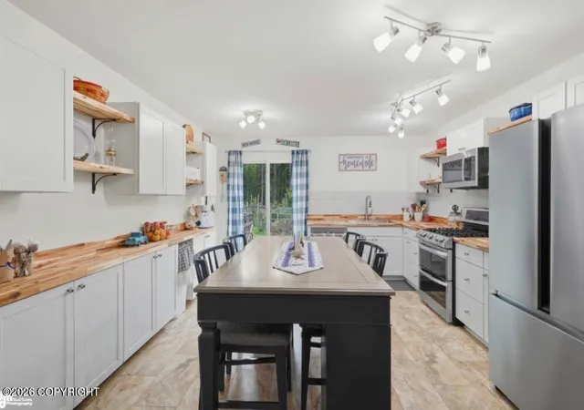 Photo 1 of Single family home for sale at 6920 W Beverly Lake Rd, Wasilla, AK 99623 | MLS# 26-8416 | Listing updated on 2026-09-06