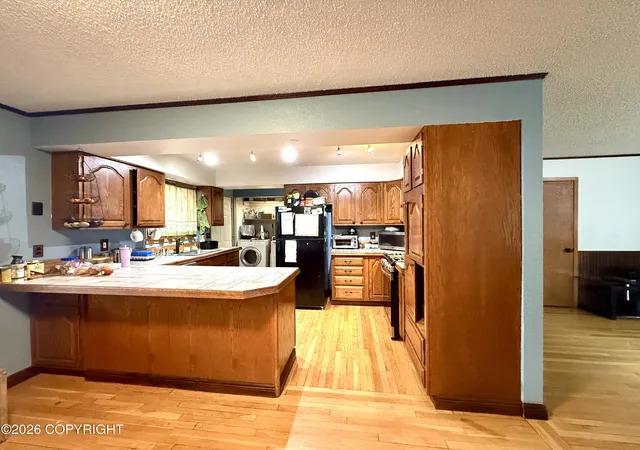 Photo 3 of Sale Pending at 8317 Seaview St, Anchorage, AK 99502 | MLS# 26-8510 | Listing updated on 2026-07-11