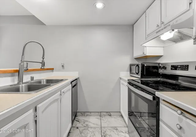Photo 4 of Condo for sale at 9625 Independence Dr #C106, Anchorage, AK 99507 | MLS# 26-8569 | Listing updated on 2026-09-18