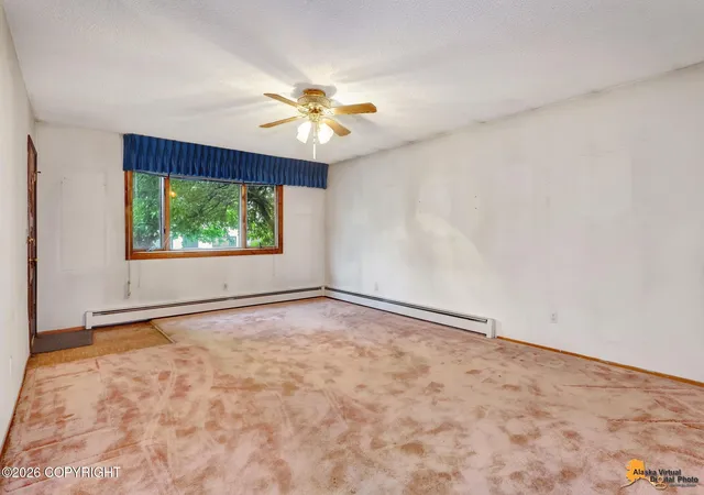 Photo 2 of Single family home for sale at 1915 Rosemary St, Anchorage, AK 99508 | MLS# 26-8798 | Listing updated on 2026-09-13