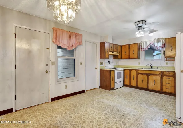 Photo 3 of Single family home for sale at 1915 Rosemary St, Anchorage, AK 99508 | MLS# 26-8798 | Listing updated on 2026-09-13
