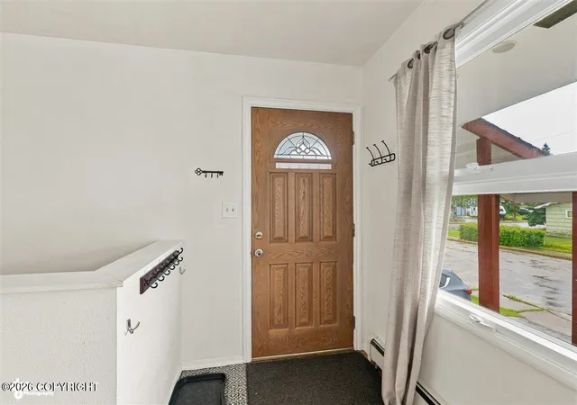 Photo 3 of Single family home for sale at 4256 Ross Ct, Anchorage, AK 99508 | MLS# 26-9087 | Listing updated on 2026-09-28