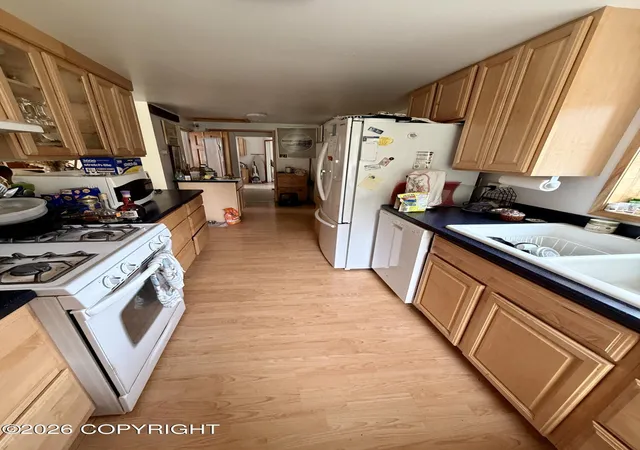 Photo 2 of Single family home for sale at 1225 Tok Cutoff, Tok, AK 99780 | MLS# 26-8742 | Listing updated on 2026-07-21