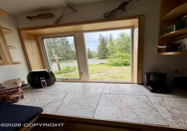 Photo 3 of Single family home for sale at 1225 Tok Cutoff, Tok, AK 99780 | MLS# 26-8742 | Listing updated on 2026-07-21