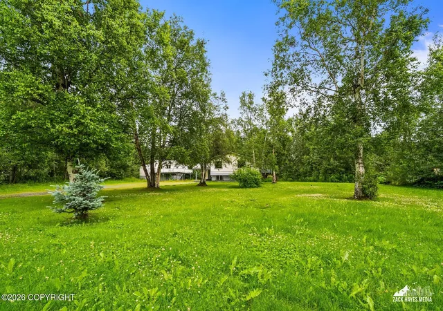 Photo 2 of Single family home for sale at 1051 N Old Trunk Rd, Palmer, AK 99645 | MLS# 26-8800 | Listing updated on 2026-08-25