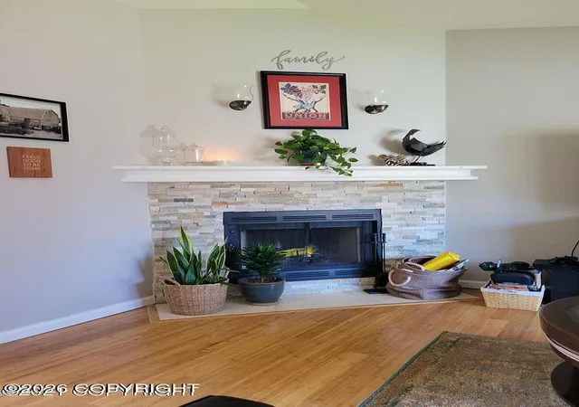 Photo 2 of Single family home for sale at 12222 Woodward Dr, Anchorage, AK 99516 | MLS# 26-8964 | Listing updated on 2026-09-12