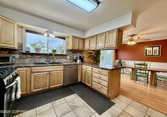 Photo 3 of Sale Pending at 1612 Cara Loop, Anchorage, AK 99515 | MLS# 26-9050 | Listing updated on 2026-09-04