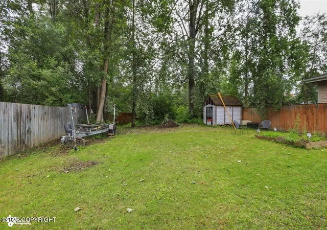 Photo 5 of Multi family home for sale at 3340 Tarwater Ave, Anchorage, AK 99508 | MLS# 26-9045 | Listing updated on 2026-07-21