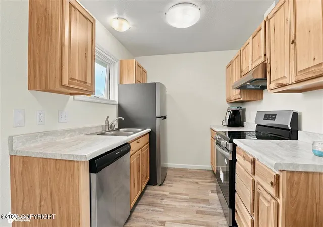 Photo 1 of Multi family home for sale at 330 N Bliss St, Anchorage, AK 99508 | MLS# 26-9043 | Listing updated on 2026-08-16