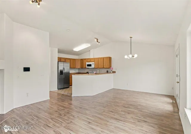 Photo 4 of Single family home for sale at 2213 Ridgemont Dr, Anchorage, AK 99507 | MLS# 26-9409 | Listing updated on 2026-09-14