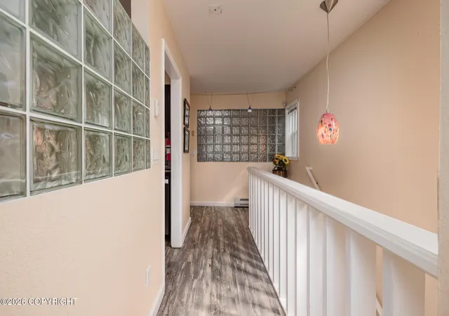 Photo 3 of Multi family home for sale at 809 Over Pl, Anchorage, AK 99501 | MLS# 26-9456 | Listing updated on 2026-08-17