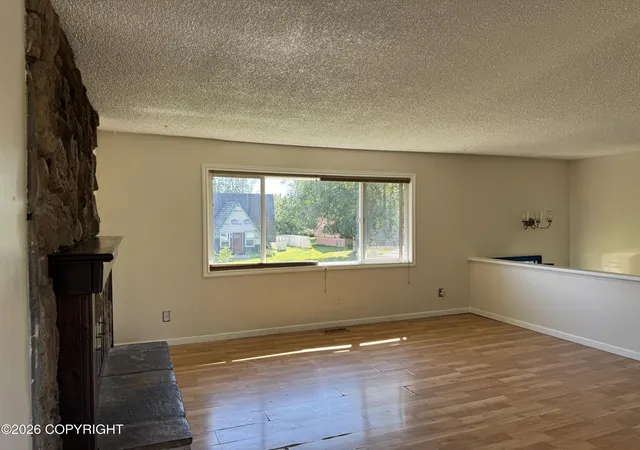 Photo 4 of Sale Pending at 725 W 72nd Avenue, Anchorage, AK 99518 | MLS# 26-9691 | Listing updated on 2026-10-20
