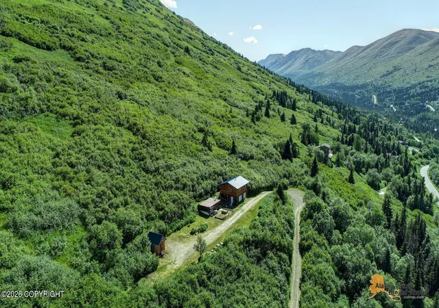 Photo 2 of Single family home for sale at 4025 Cotton Grass Dr, Eagle River, AK 99577 | MLS# 26-9531 | Listing updated on 2026-09-15