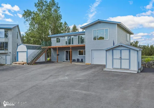 Photo 2 of Multi family home for sale at 1018 E Lake Shore Ave, Wasilla, AK 99654 | MLS# 26-9698 | Listing updated on 2026-08-19