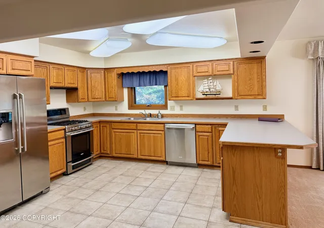 Photo 2 of Single family home for sale at 1012 W 20th Avenue, Anchorage, AK 99503 | MLS# 26-9730 | Listing updated on 2026-08-03