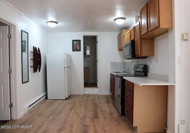 Photo 4 of Multi family home for sale at 1310 Ingra St, Anchorage, AK 99501 | MLS# 26-9781 | Listing updated on 2026-08-03