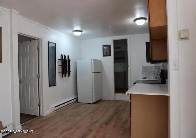 Photo 5 of Multi family home for sale at 1310 Ingra St, Anchorage, AK 99501 | MLS# 26-9781 | Listing updated on 2026-08-03