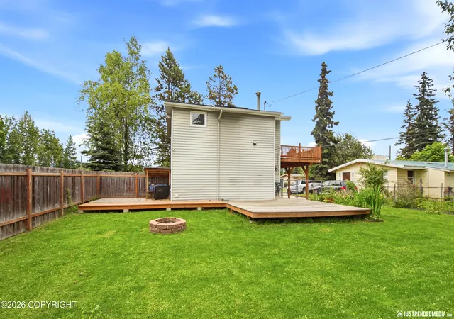 Photo 2 of Single family home for sale at 1300 Wintergreen St, Anchorage, AK 99508 | MLS# 26-9990 | Listing updated on 2026-08-07