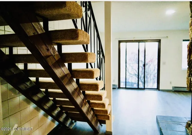 Photo 3 of Condo for sale at 9336 Blackberry St #29, Anchorage, AK 99502 | MLS# 26-10125 | Listing updated on 2026-08-19