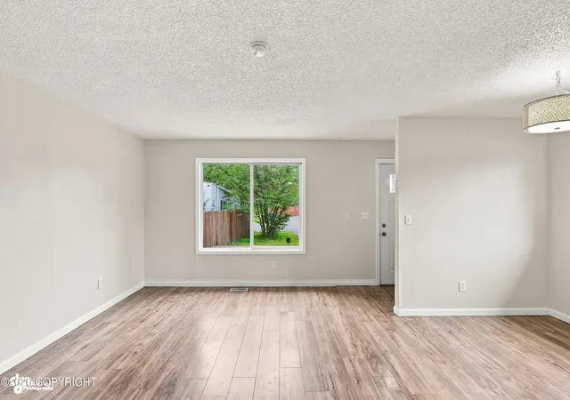 Photo 2 of Sale Pending at 301 Dannilyn Cir, Anchorage, AK 99504 | MLS# 26-10041 | Listing updated on 2026-08-19