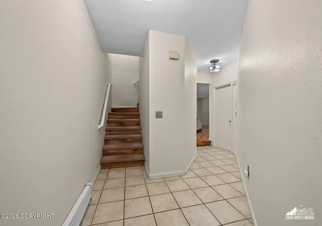Photo 3 of Single family home for sale at 7822 Raymar Cir, Anchorage, AK 99518 | MLS# 26-10188 | Listing updated on 2026-08-16