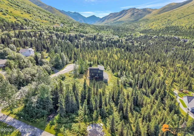 Photo 2 of Sale Pending at 1910 S River Dr, Eagle River, AK 99577 | MLS# 26-10340 | Listing updated on 2026-09-09
