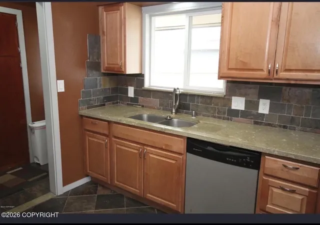 Photo 4 of Multi family home for sale at 1633 Northwestern Ave, Anchorage, AK 99508 | MLS# 26-10370 | Listing updated on 2026-10-07