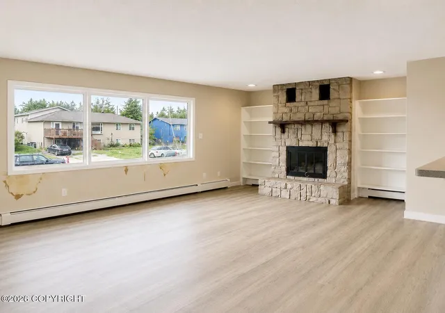 Photo 2 of Sale Pending at 4336 E 6th Avenue, Anchorage, AK 99508 | MLS# 26-10360 | Listing updated on 2026-10-18