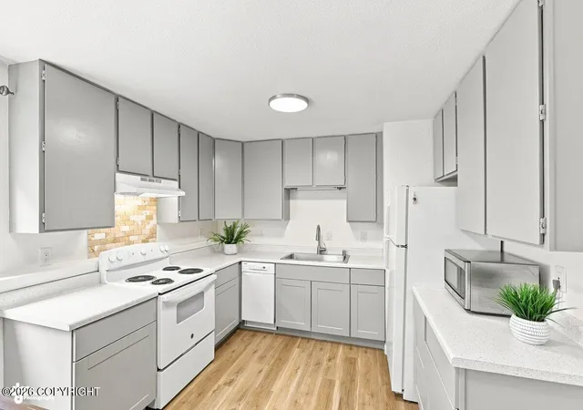 Photo 1 of Condo for sale at 7061 Weimer Rd #1, Anchorage, AK 99502 | MLS# 26-10373 | Listing updated on 2026-08-31