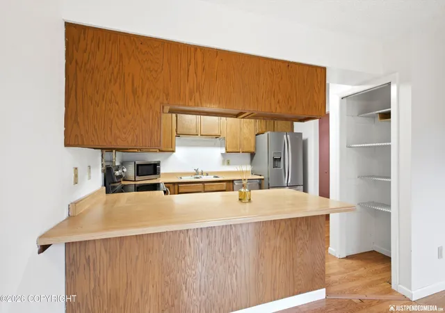 Photo 4 of Single family home for sale at 7706 Linda Ln, Anchorage, AK 99518 | MLS# 26-10445 | Listing updated on 2026-09-25