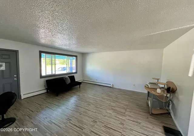 Photo 2 of Single family home for sale at 4208 Mcphee Ave, Anchorage, AK 99508 | MLS# 26-10446 | Listing updated on 2026-08-17