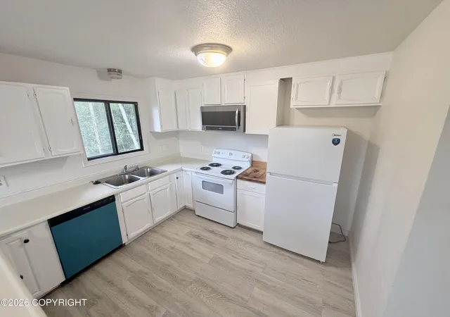 Photo 2 of Multi family home for sale at 7901 Northwind Ave, Anchorage, AK 99504 | MLS# 26-10459 | Listing updated on 2026-09-11