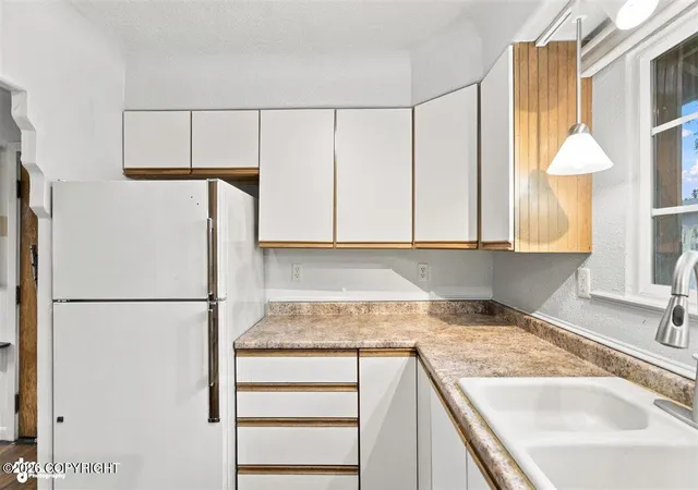 Photo 24 of Single family home for sale at 1335 Ingra St, Anchorage, AK 99501 | MLS# 26-10509 | Listing updated on 2026-08-24